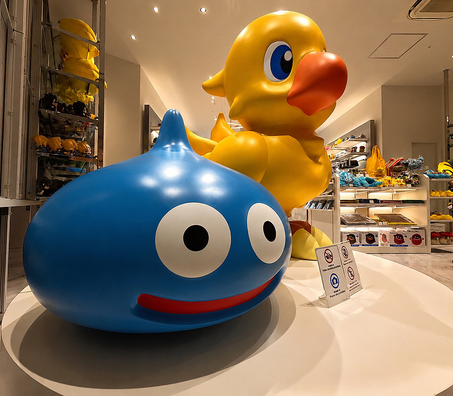 Slime and giant duck statues from Dragon Quest on display in a Shibuya store
